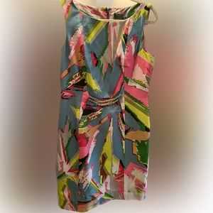 Taylor pattern great color combination dress with waist gold roping.